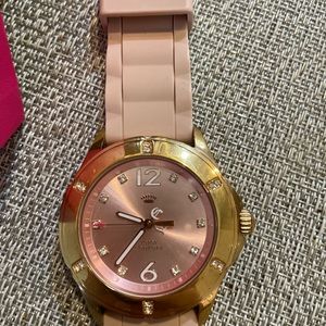 Beautiful Juicy Couture watch.. Light Pink w/ Gold Detail trim